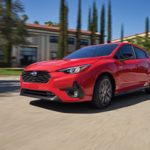 2026款斯巴鲁Impreza RS掀背车,红色车身动态行驶,全时四驱